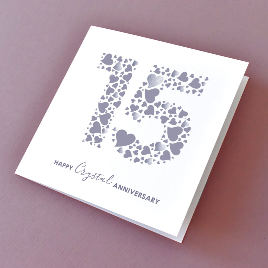 Angled view of a '15th Anniversary' card, showcasing the tactile feel of the love heart "15" with sequin accents. Ideal milestone card for a special couple.