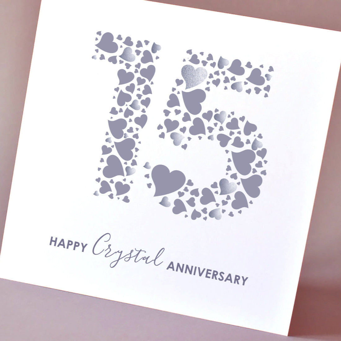 Unique 15th wedding anniversary card for couples. "15 Years Crystal Anniversary" with a bold love heart design and sparkling sequin details. Perfect greeting card.