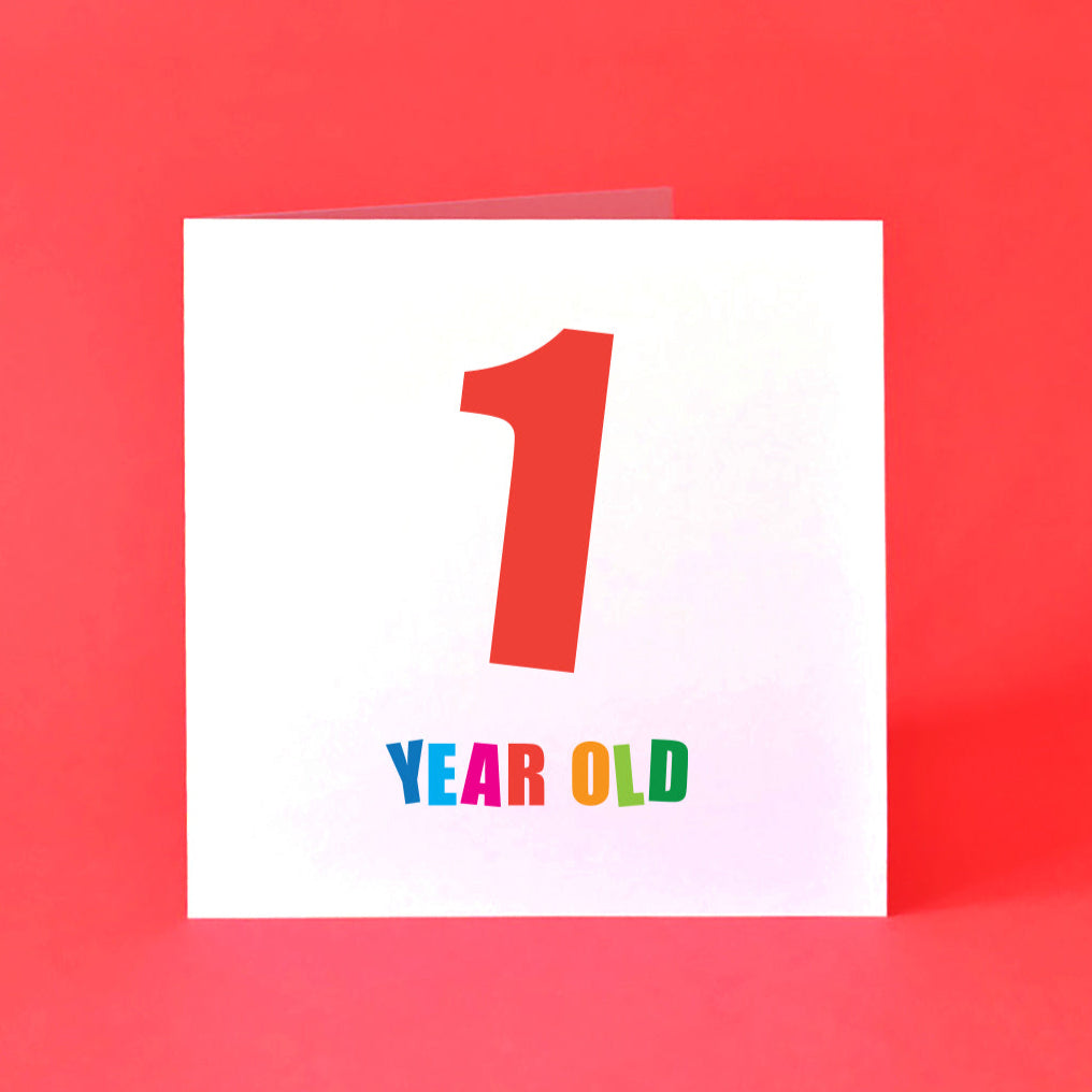 Card with '1 YEAR OLD' text in bright, bold colours.