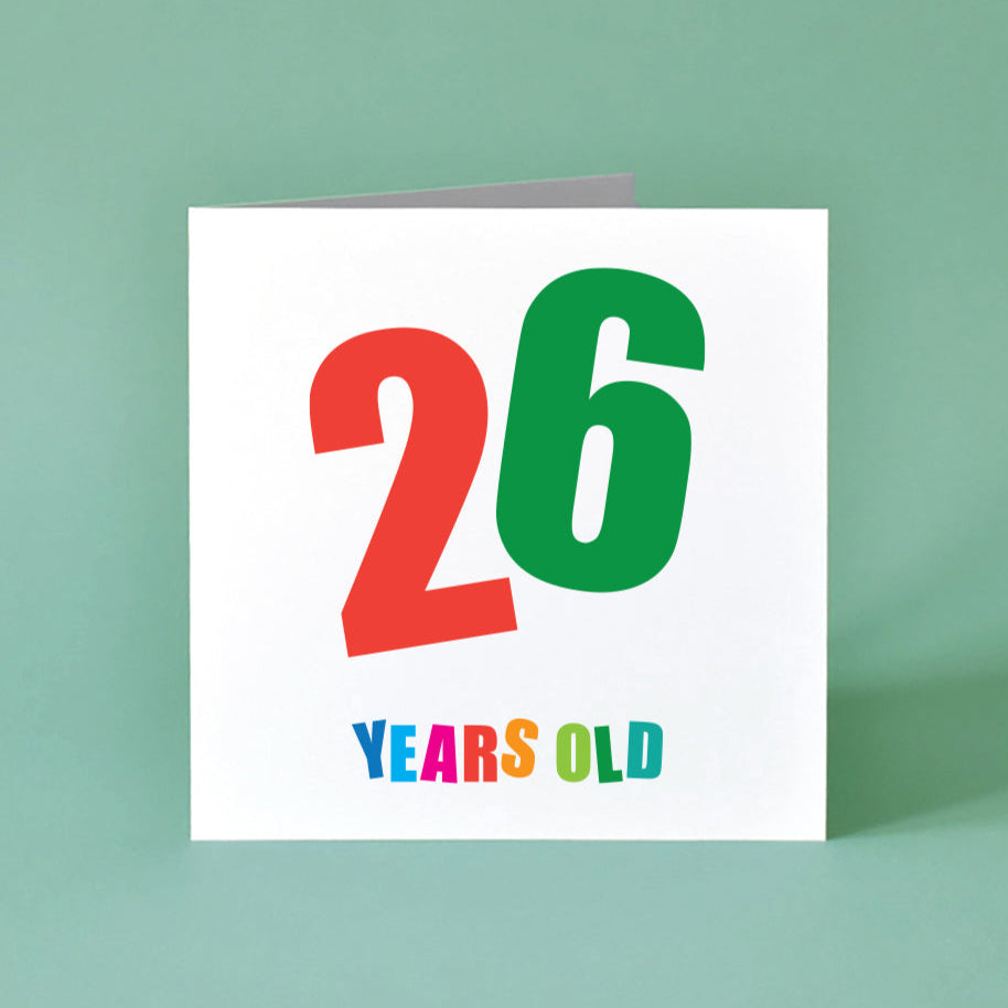 This vibrant, gender-neutral birthday card is designed to be a bold and memorable option. The card showcases a distinct '26' in the center, with each digit a different bright color and playfully tilted. Below, "Years Old" adds a clean, direct touch, each letter popping in a vibrant, distinct shade.