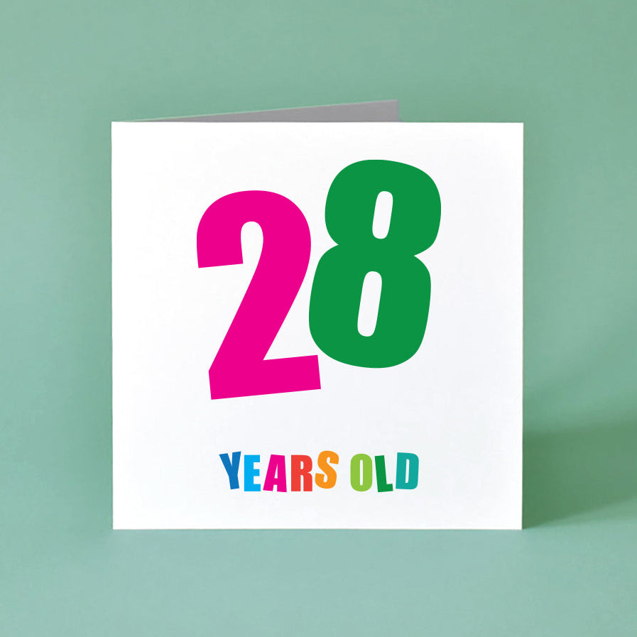 This vibrant, gender-neutral birthday card is designed to be a memorable option. The card features a bold '28' in the center, with each digit a different bright color and angled playfully. Below, "Years Old" adds a clean, direct touch, with each letter in a vibrant, distinct shade.