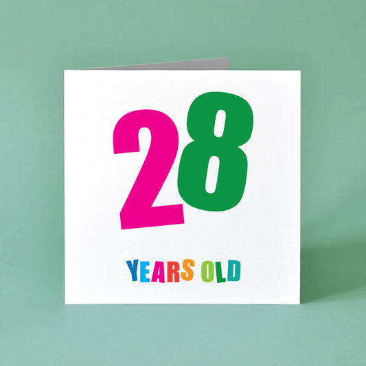 This vibrant, gender-neutral birthday card is designed to be a memorable option. The card features a bold '28' in the center, with each digit a different bright color and angled playfully. Below, "Years Old" adds a clean, direct touch, with each letter in a vibrant, distinct shade.