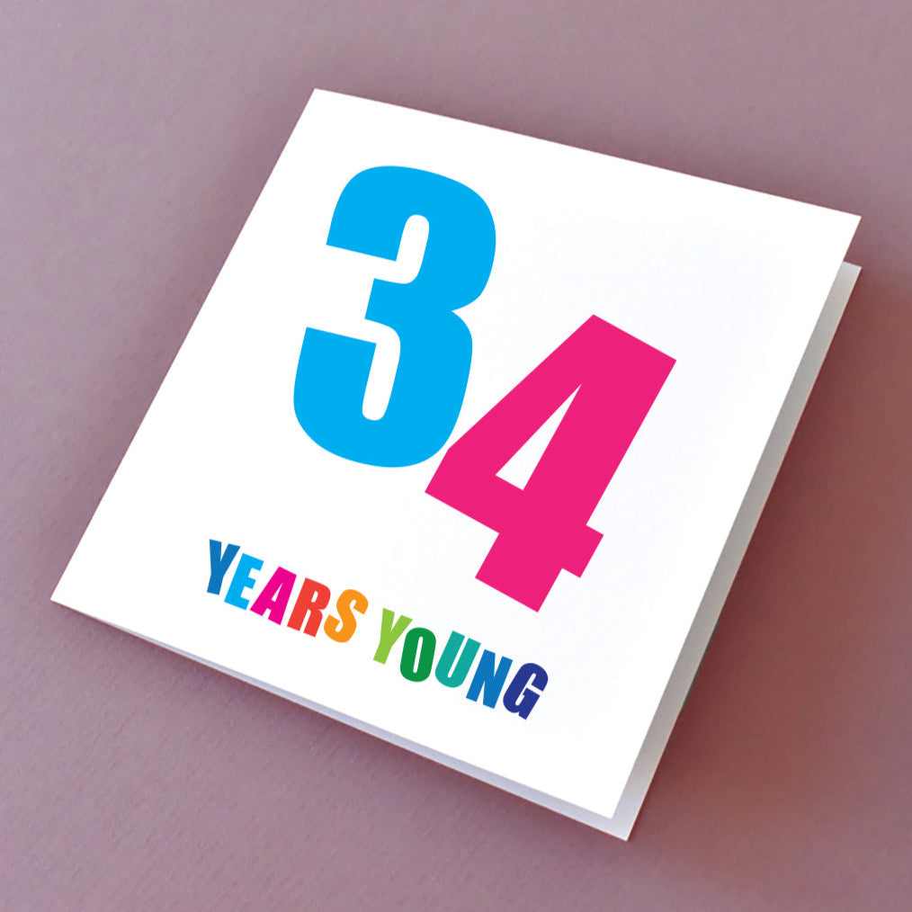 Birthday card with '34 Years Young' text in a bold colours.