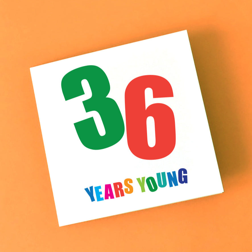 Birthday card with '36 Years Young' text in orange and green and multi colours.