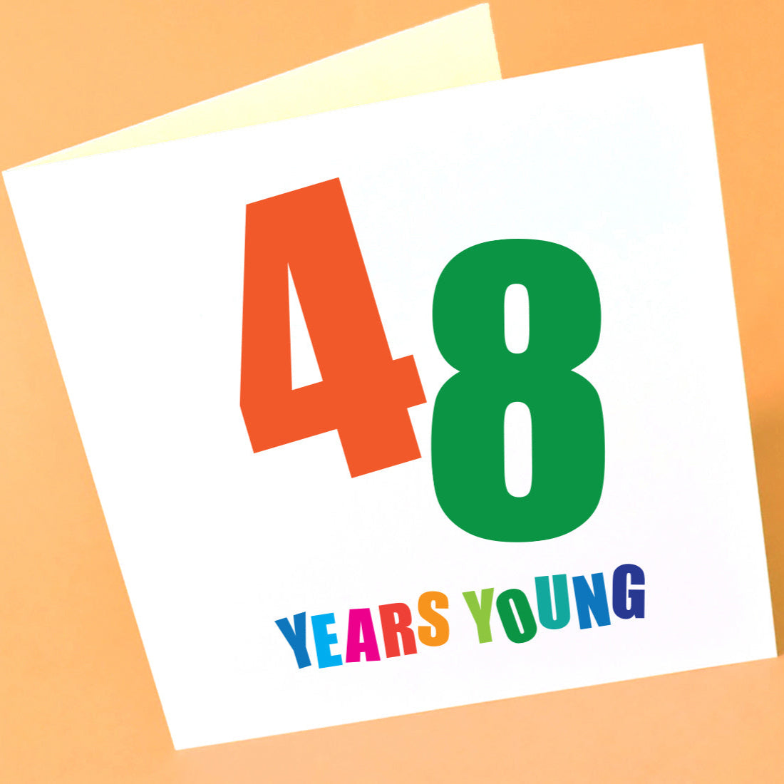 Birthday card with '48 Years Young' in bright text.