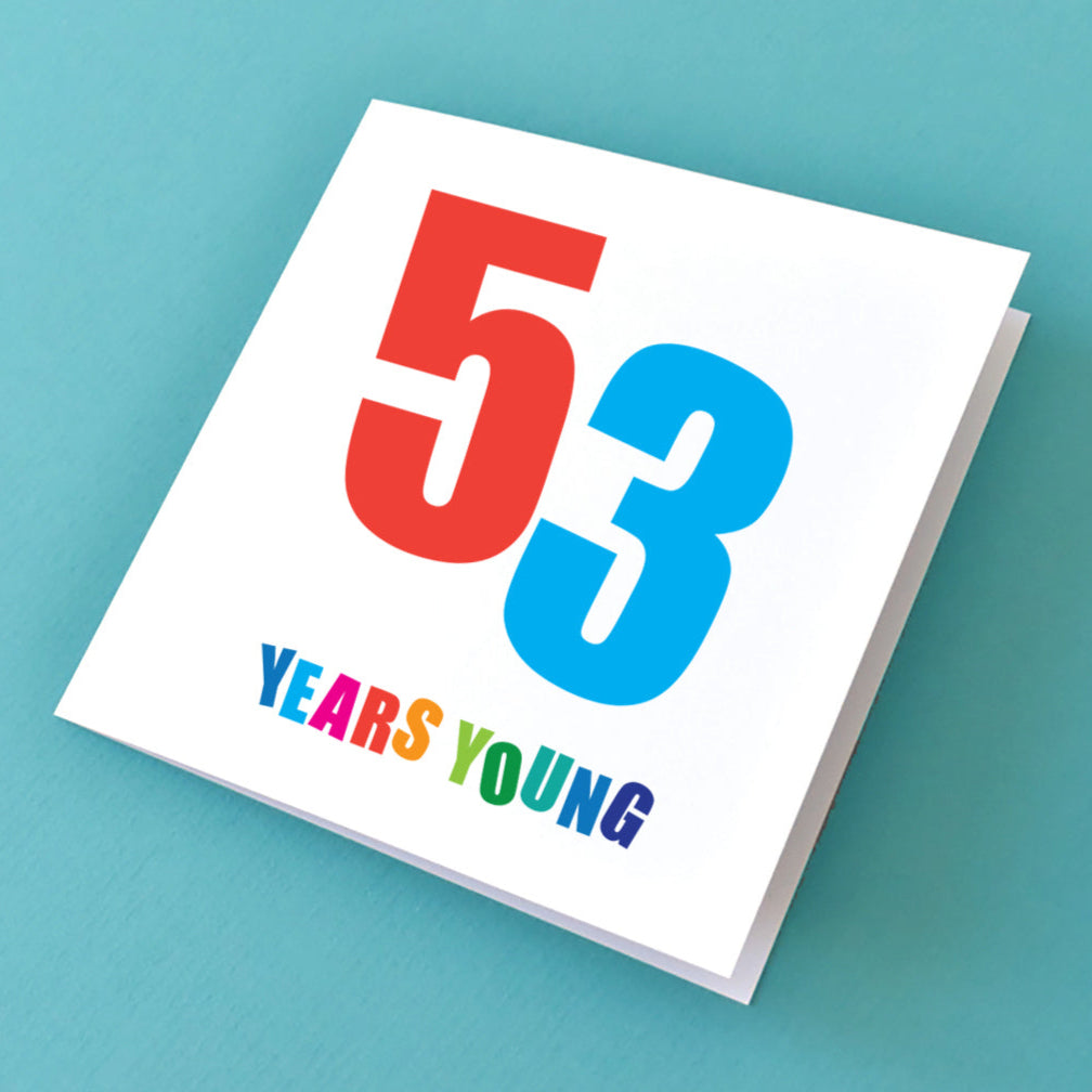 Close-up of a happy 53rd birthday card, showcasing bright colours and dynamic text to celebrate life's journey.