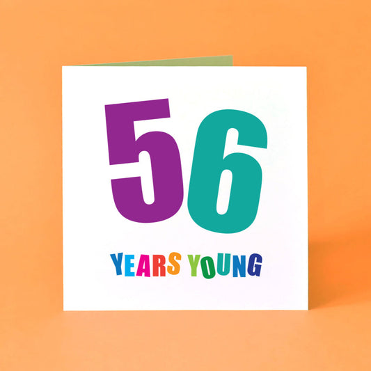 A cheerful 'Fifty-Six Years Young' birthday card, featuring a bright, energetic design and playful, colourful lettering.