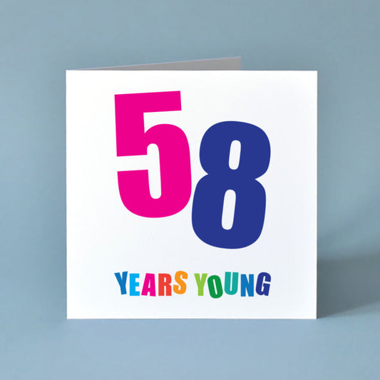 lively 'Fifty-Eight Years Young' birthday card, bursting with bright, cheerful colours and an energetic, modern design.