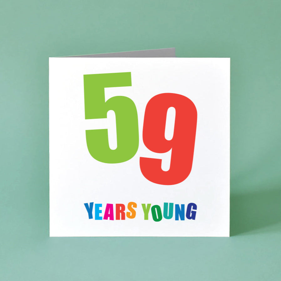 Cheerful 'Fifty-Nine Years Young' birthday card with a vibrant, colourful design and playful, energetic lettering.