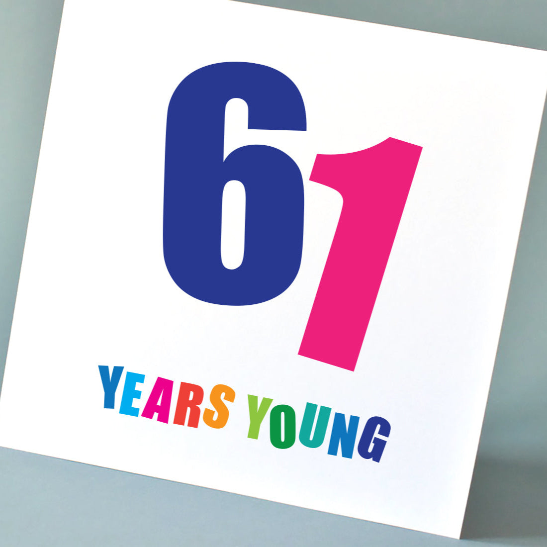 Close-up of "61 Years Young" card, showing the vibrant, energetic numbers and cheerful multi-coloured lettering.