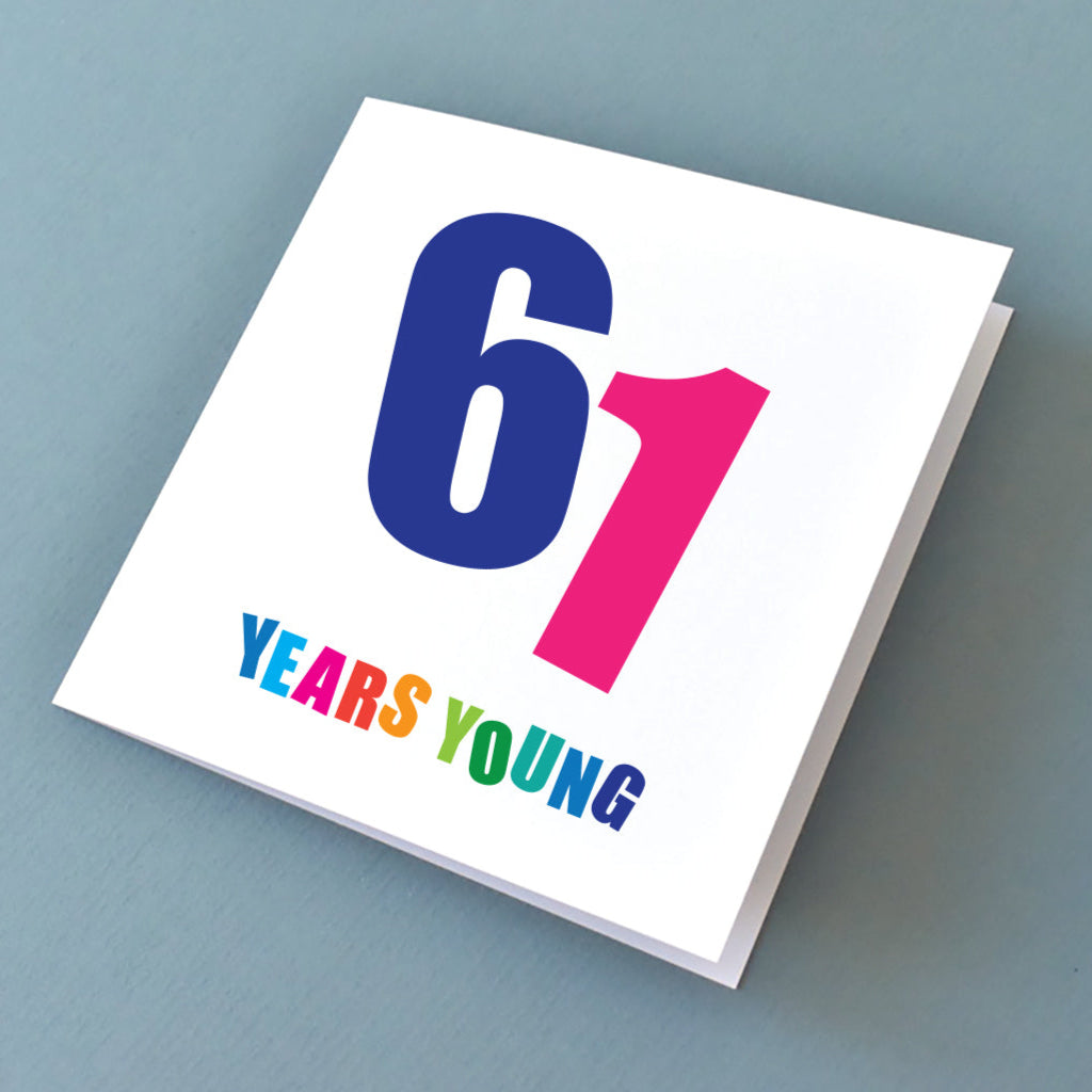 Vibrant 61st birthday card displayed, highlighting its eye-catching design, perfect for marking an individual milestone.