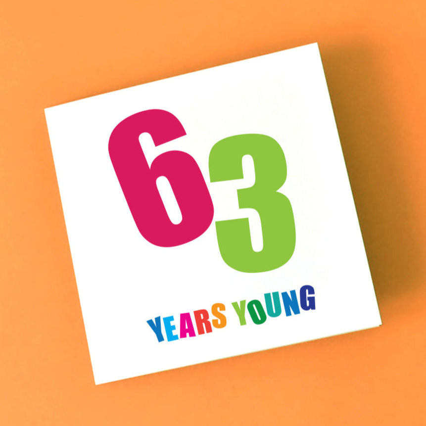 Close-up of "63 Years Young" card, highlighting the bright, bold, angled numbers and bursting individual coloured letters.