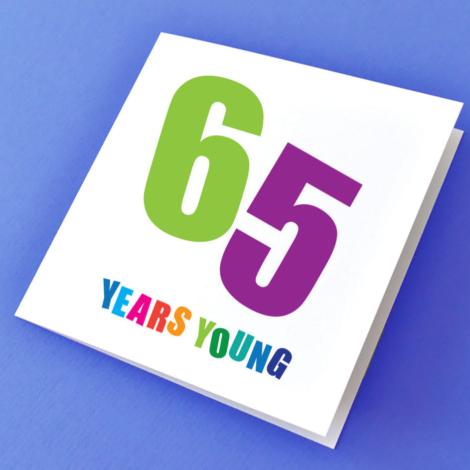 65 Years Young Birthday card with bold, colourful text.