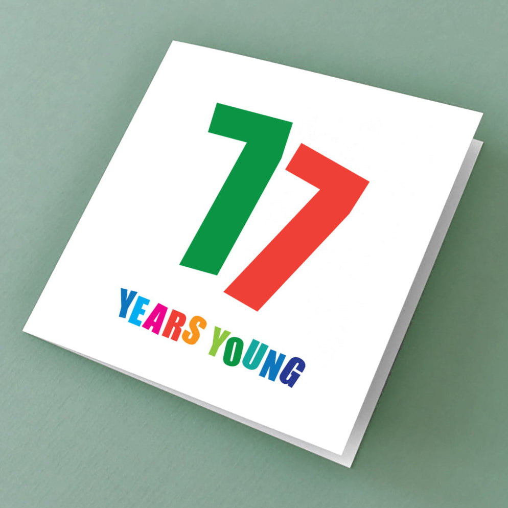 77th Special Birthday card with large bold 77 and colourful years young underneath.