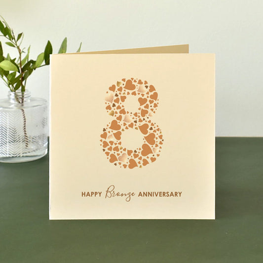 8th anniversary card with number 8 made from an array of love hearts and 'Happy Bronze Anniversary' text underneath.
