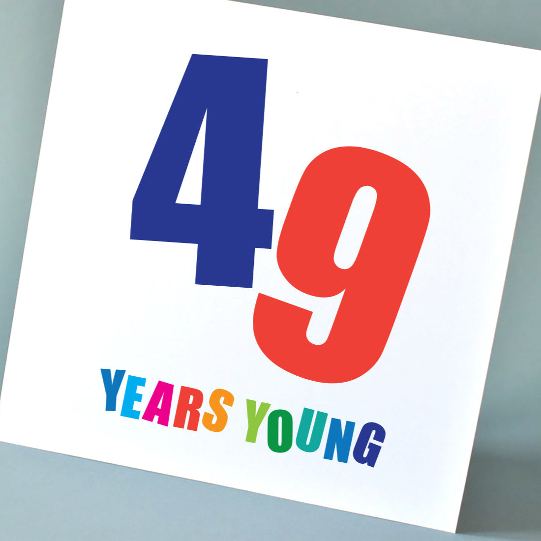 Birthday card with '49 Years Young' text in bright colours on a white background.