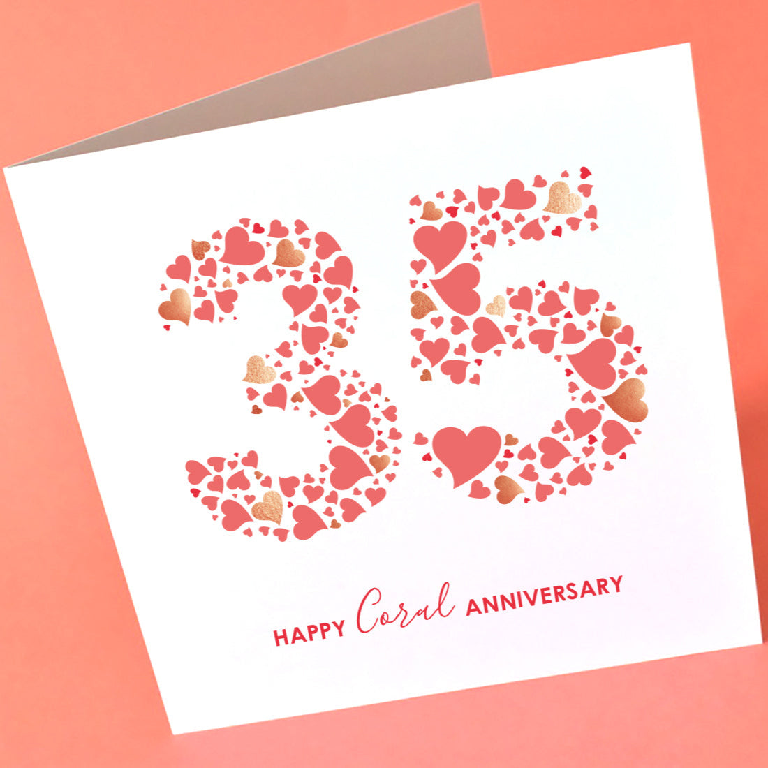 Close-up of the Coral Anniversary card, showing the intricate design of the "35" made from vibrant, textured coral love hearts.