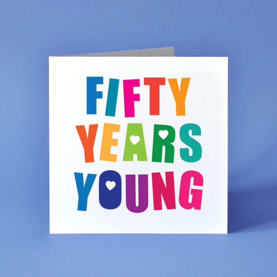 Square white birthday card that reads Fifty Years Young in colourful text.