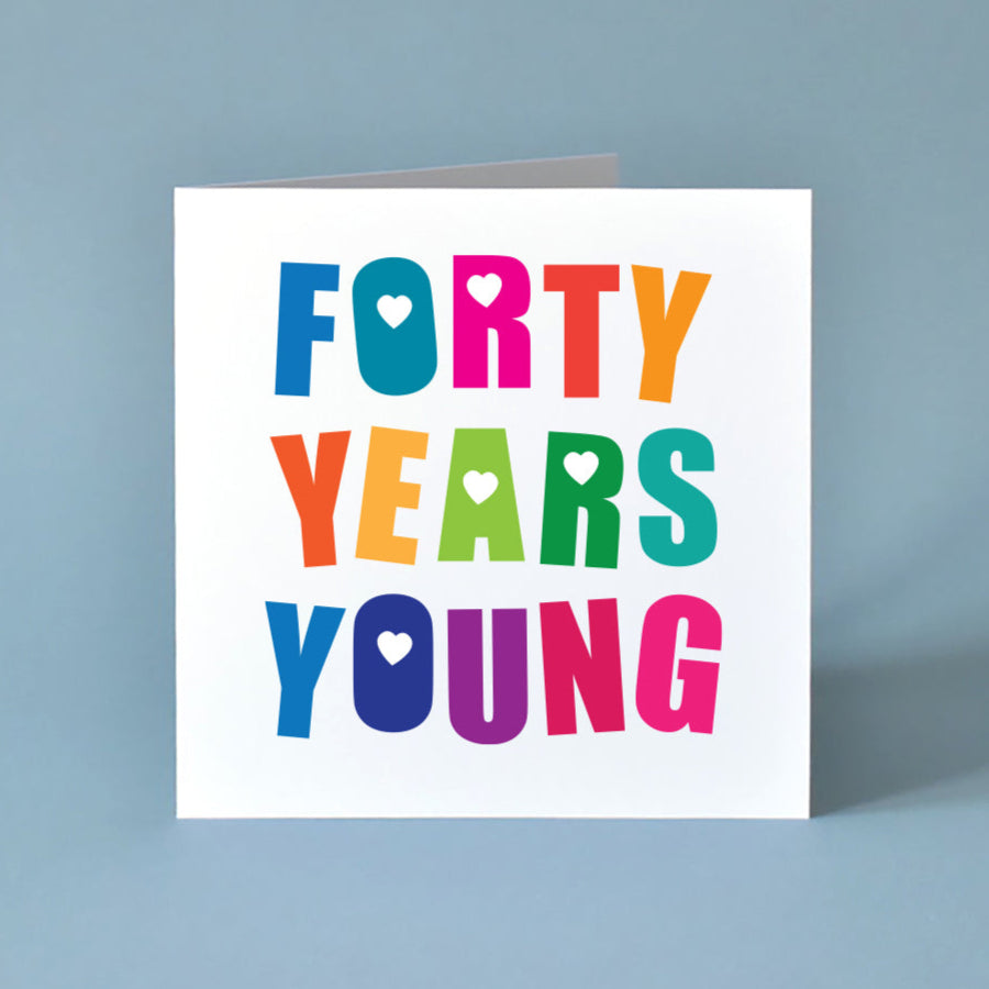 A vibrant and energetic 'Forty Years Young' birthday card, featuring bold, celebratory text and a joyful, colourful design