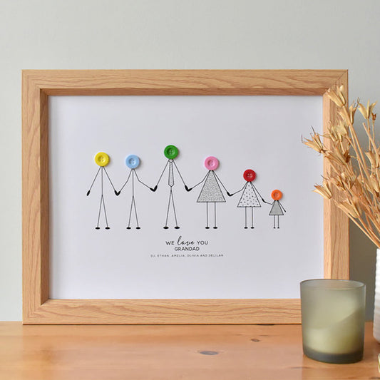 Fully personalised A3 print showing grandad and his grandchildren as stick drawn characters with coloured button heads. All characters are holding hands. Underneath the line up are the words 'We Love You Grandad" followed by the name of all he grandchildren.