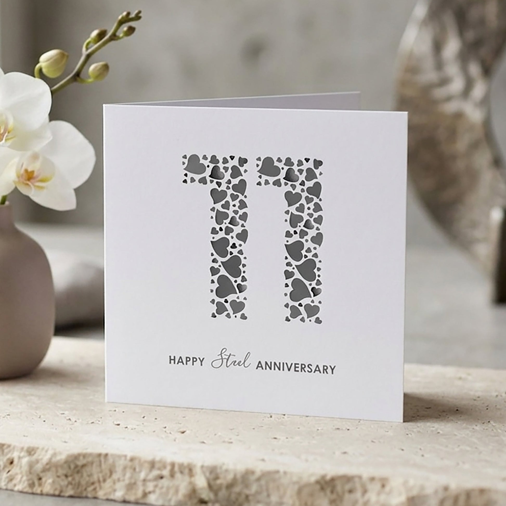 Minimalist Happy Steel Anniversary card in shades of grey for an 11 year milestone partnership.