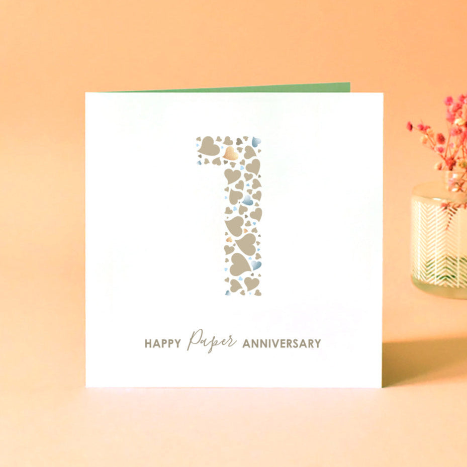 Anniversary card with love heart design and 'Happy Paper Anniversary' message underneath.