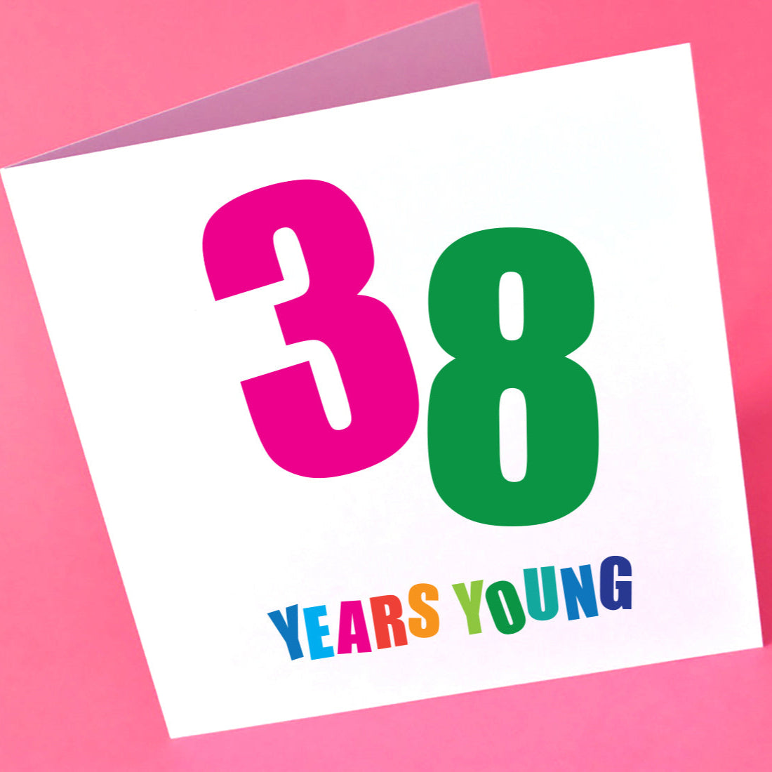 Birthday card with '38 Years Young' text in bright colours.
