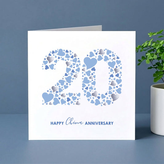 Digital china anniversary card with the number 20 and 'Happy Anniversary' text, decorated with blue hearts.