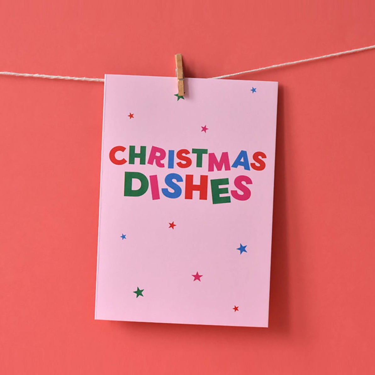 Pink card with 'Christmas Dishes' text in bold colours.