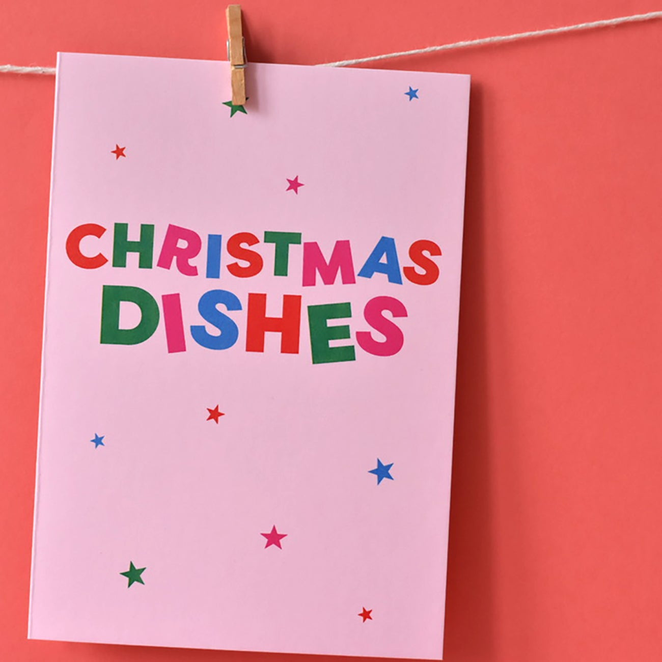 Relatable Christmas Card on pink card with 'Christmas Dishes' text.