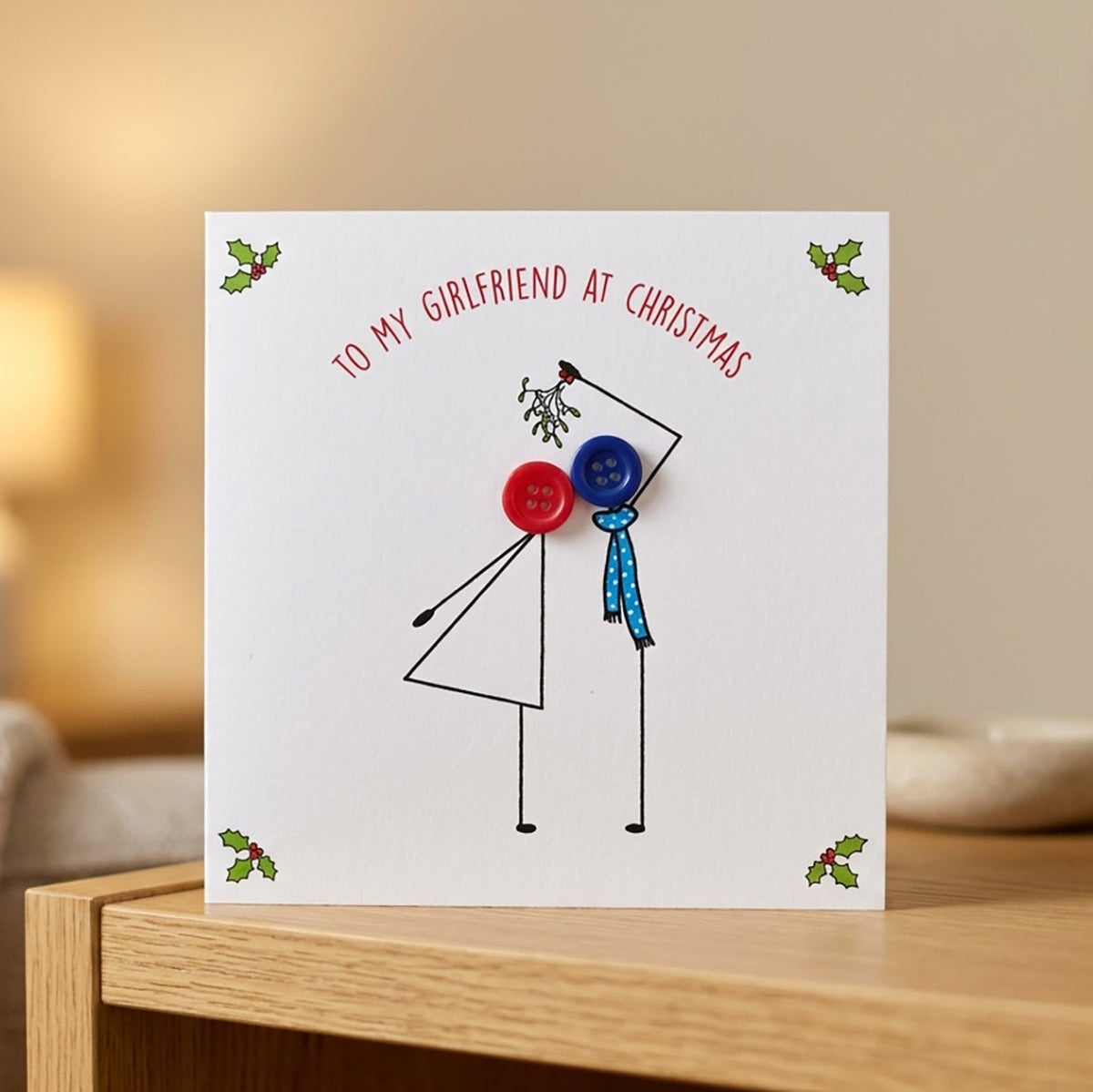Cute kissing under the mistletoe card for your Girlfriend at Christmas.