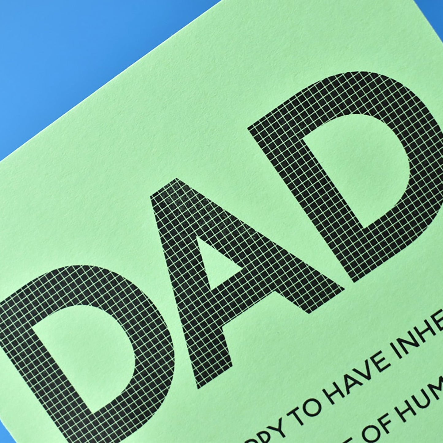 Close up of the pattern inside the word Dad on the green card.