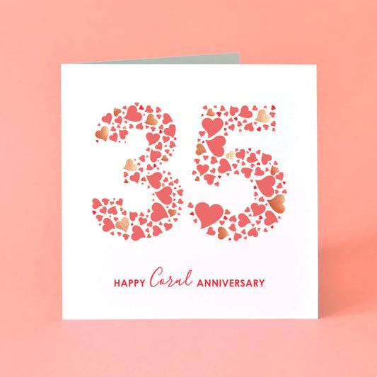 Square white 35th Coral Anniversary card with "35" formed by various coral-toned love hearts. Text reads "Happy Coral Anniversary