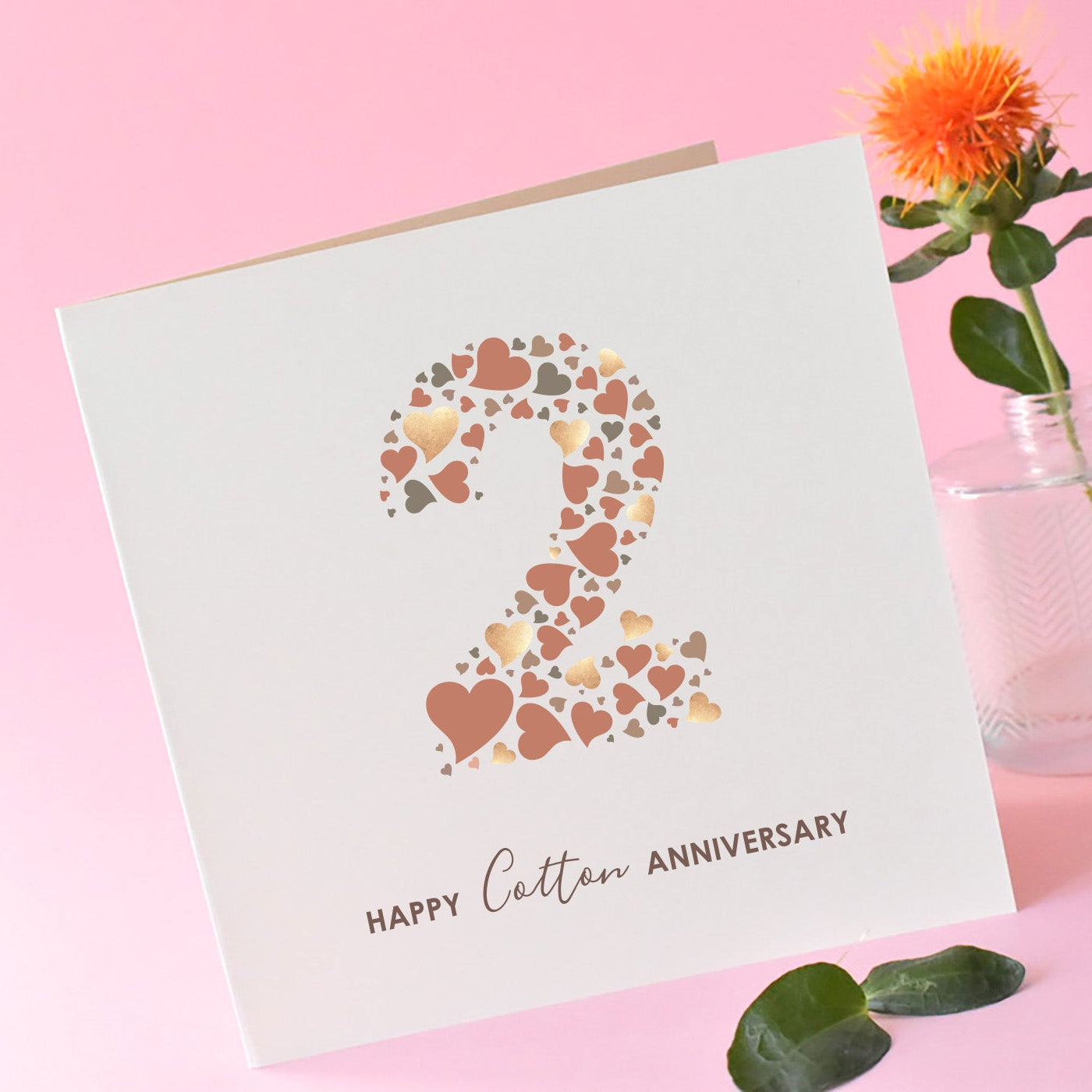 Cotton Wedding Anniversary card with a large number 2 central on a cream card and the words "Happy Cotton Anniversary" underneath.