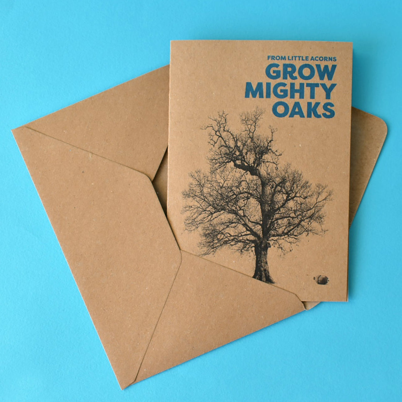 Greeting card featuring a small acorn and a tall oak tree with the words ‘From little acorns grow mighty oaks’ – a heartfelt design for Father’s Day, Mother’s Day, or thank yous.