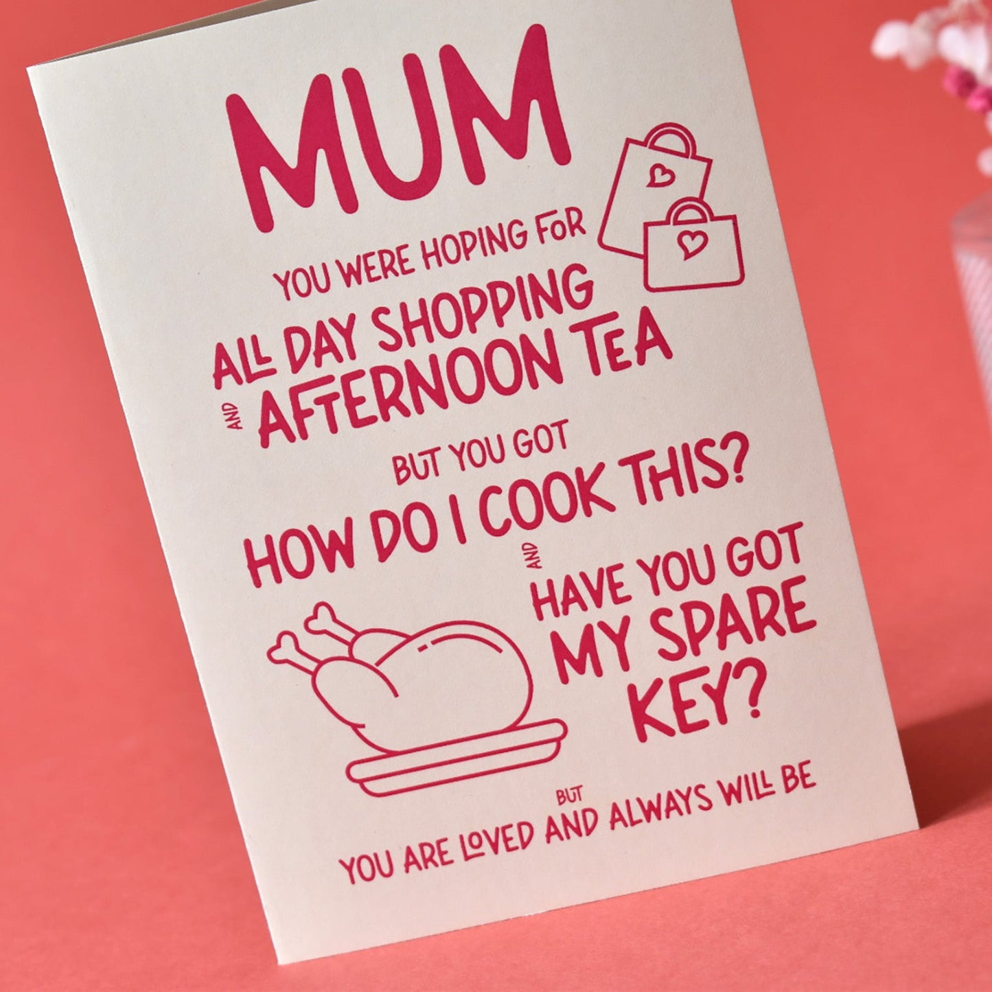 Cream card with pink text thats reads "Mum your were hoping for all day shopping and afternoon tea but you got “how do I cook this” and have you got my spare key? BUT you are loved and always will be."