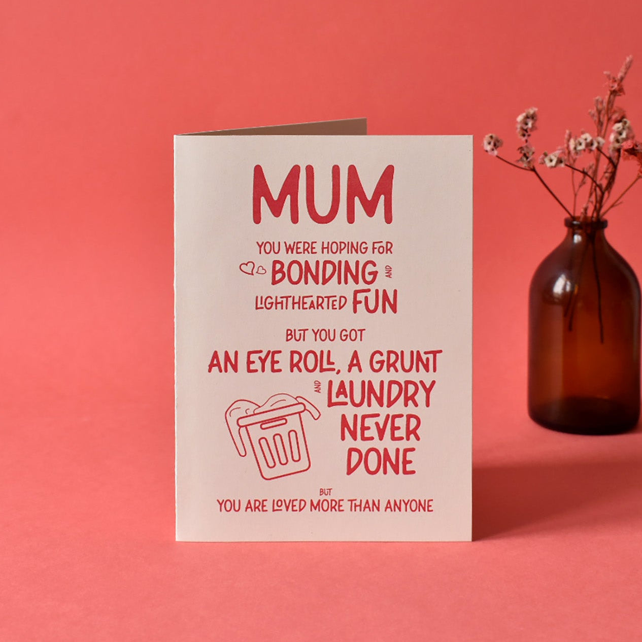 Cream funny Mothers Day card that reads "Mum you were hoping for bonding and lighthearted fun but you got an eye roll, a grunt and laundry never done BUT you are loved more than anyone."