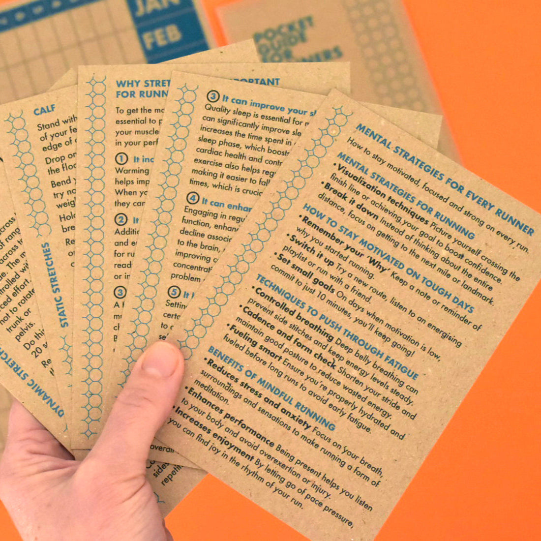 Selection of running tip cards covering strength, recovery, and mindset strategies.