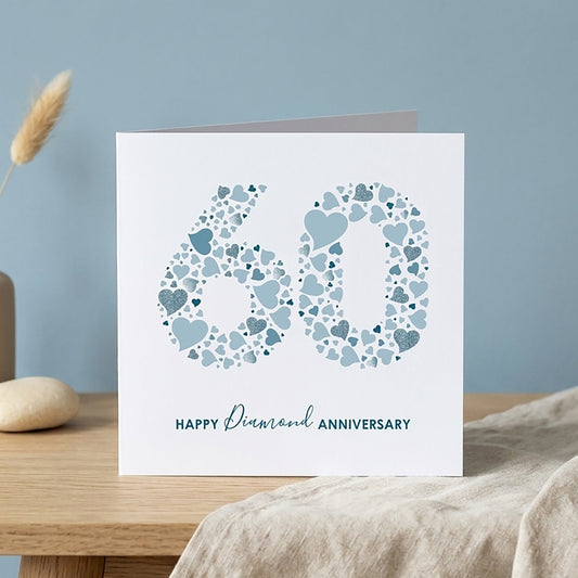 60th anniversary card with a modern blue heart design forming a large number 60 with the printed greeting Happy Diamond Anniversary.