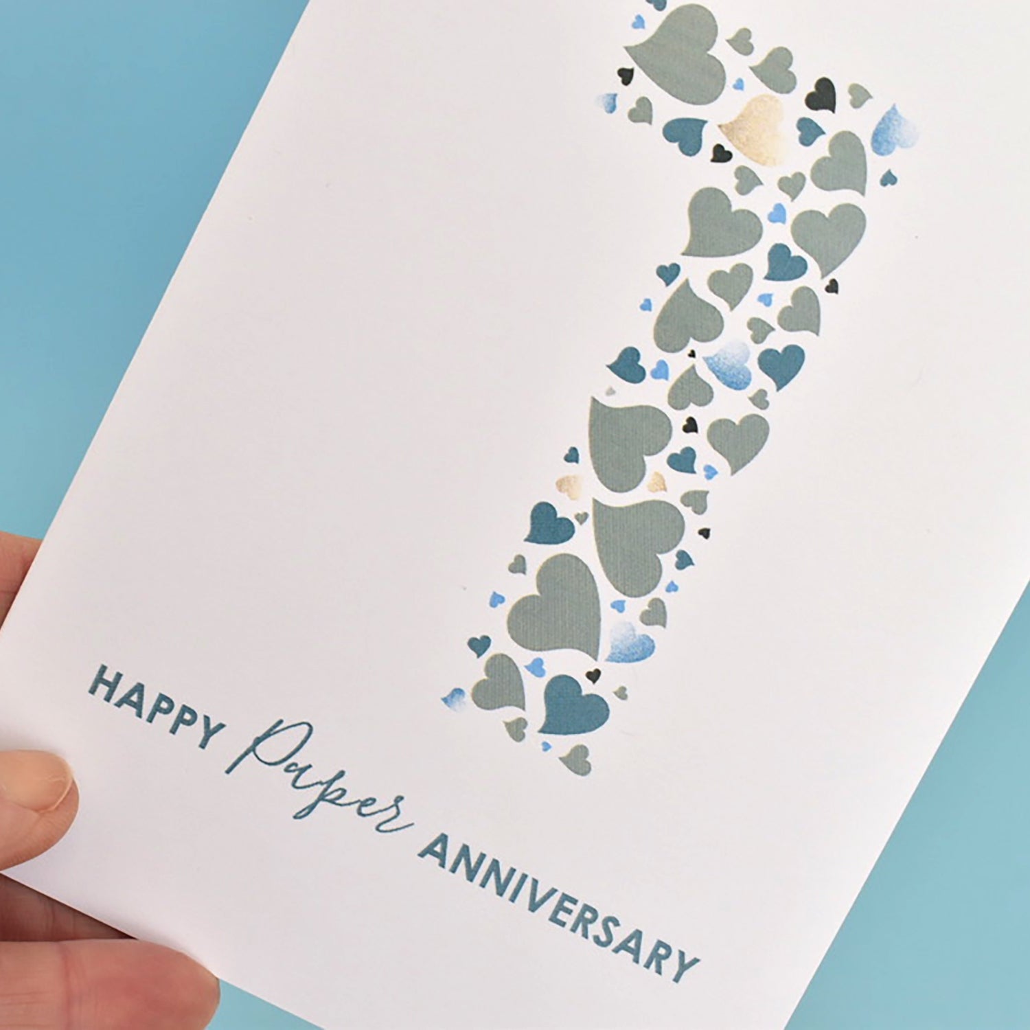 Anniversary card with love heart design and 'Happy Paper Anniversary' message underneath.