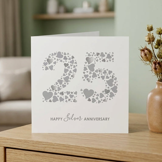 Card with '25 made from lots of silver love hearts and Happy Silver Anniversary' underneath the large number 25.