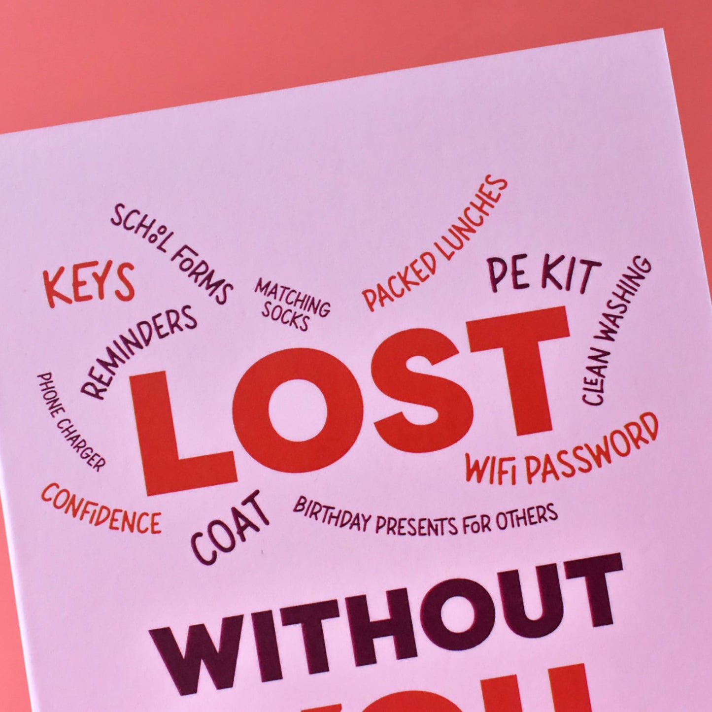 Close-up of the 'Lost without you Mam' card showing the vibrant red typography and high-quality matte finish. The perfect relatable card for a Mam’s birthday or Mother’s Day, celebrating her 'invisible load' of daily chores.