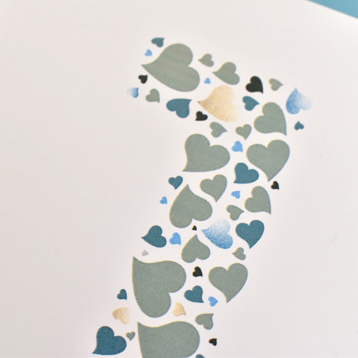 Love heart detailing to make up the number 1 on the anniversary card.