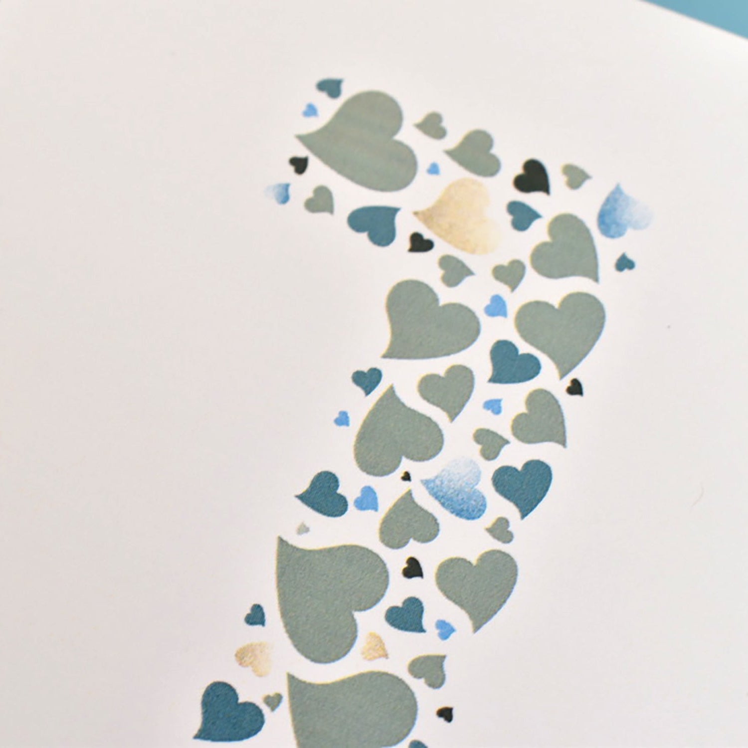 Love heart detailing to make up the number 1 on the anniversary card.
