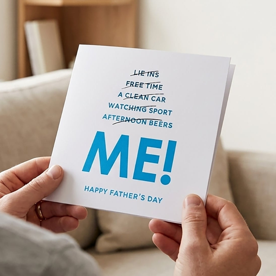 Person holding a Father's Day card with text that reads “Lie Ins, Free Time, A Clean Car, Watching Sport and Afternoon Beers” — all hilariously crossed out to reveal what he actually gets instead… "Me" in bold, unapologetic letters!