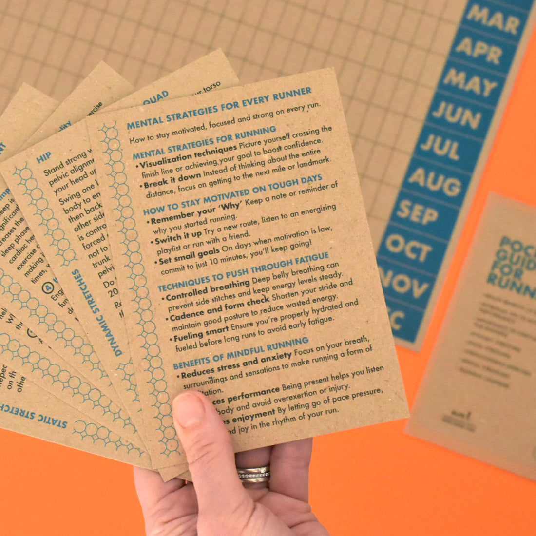 Selection of running tip cards covering strength, recovery, and mindset strategies.