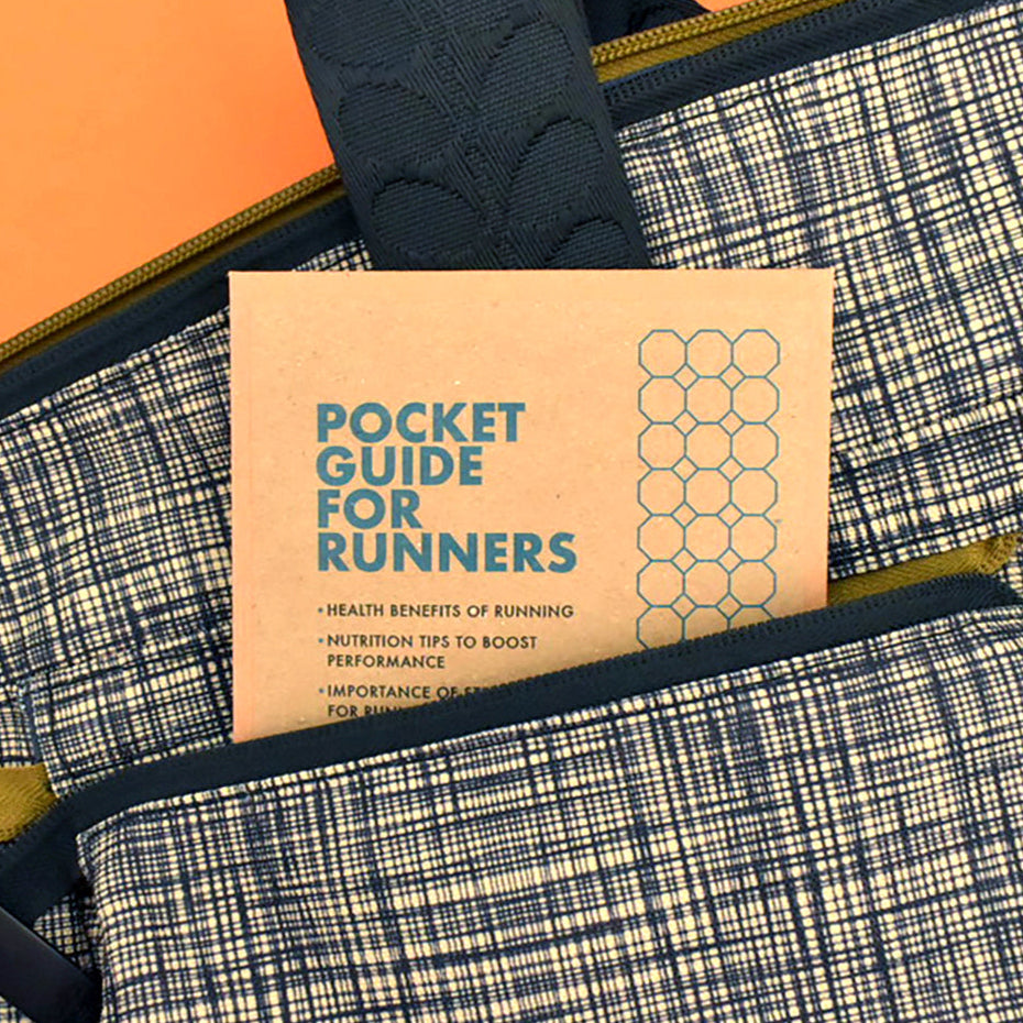 Close-up of A6 kraft wallet holding Pocket Guide for Runners cards.