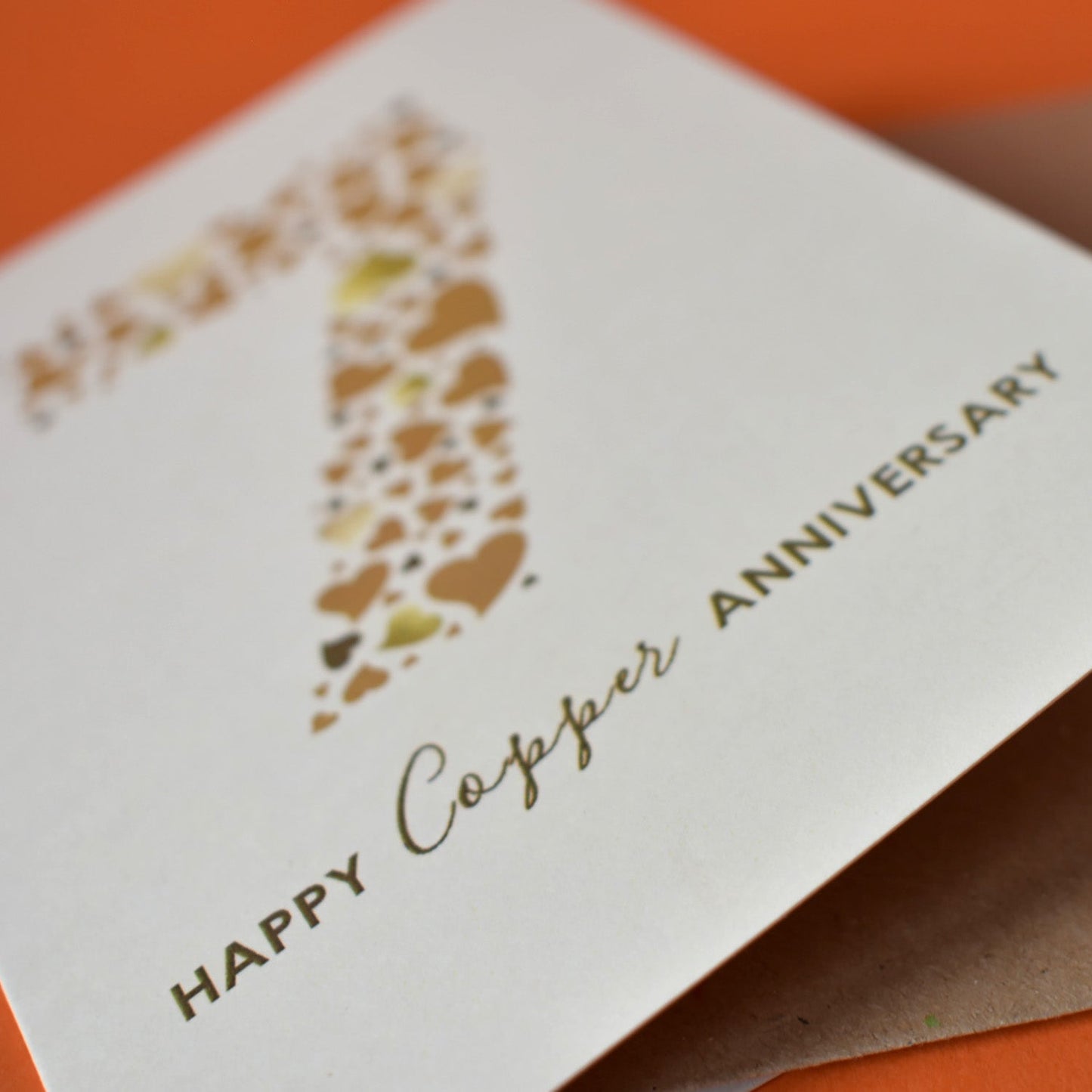 Card with 'Happy Copper Anniversary' text on thick cream cardstock.